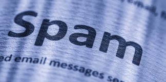 Forstørret "spam"-tekst på et stykke papir