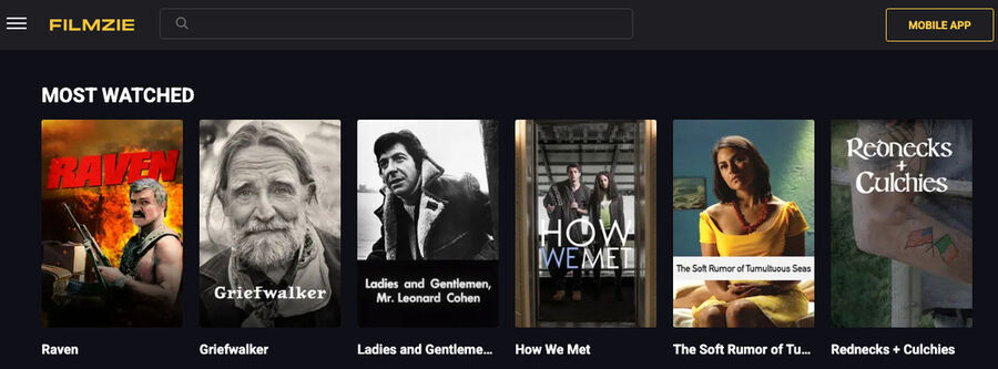 Skærmbillede fra Filmzie-platformen med sektionen "Most Watched" og en række populære filmtitler vist på rad.