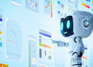 Venlig robot interagerer med digitale skærme og grafer, som illustrerer brugen af moderne AI-værktøjer til dataanalyse og automatisering.